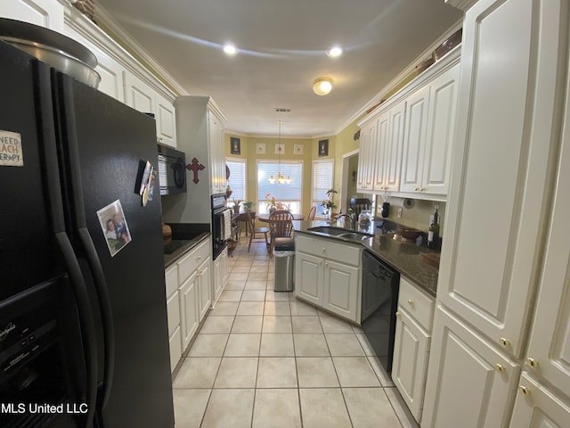 kitchen featuring light tile patterned floors, ornamental molding, black appliances, white cabinetry, and dark countertops