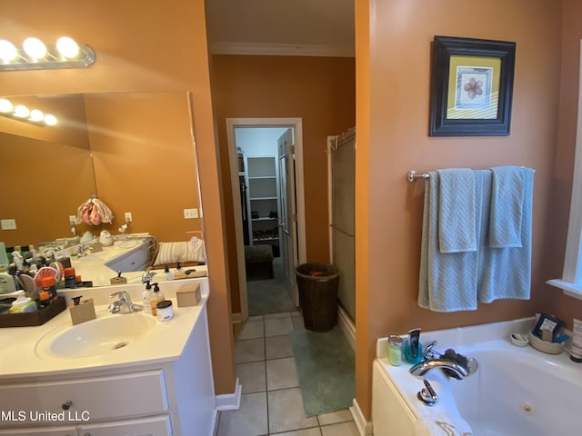 full bath featuring a shower stall, crown molding, a whirlpool tub, tile patterned floors, and vanity