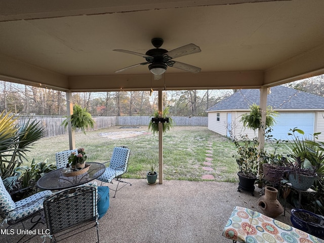 view of patio / terrace with a fenced backyard and a ceiling fan