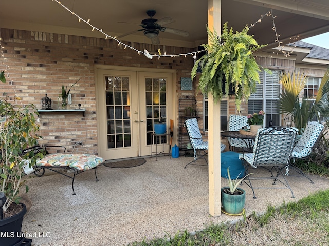 view of patio / terrace with a ceiling fan and french doors