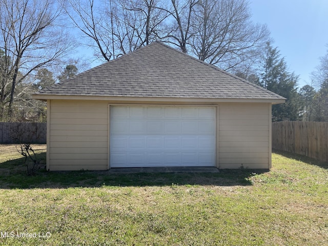 detached garage with fence