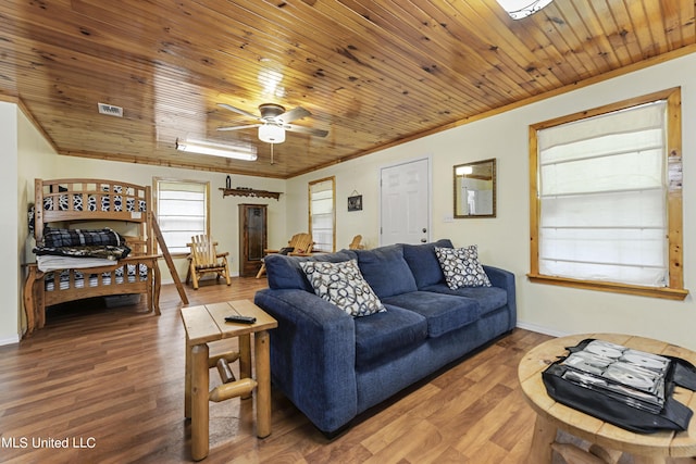 living room with baseboards, a ceiling fan, wood finished floors, and wooden ceiling