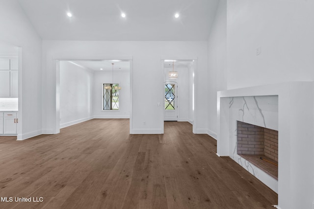 308 Lois Ct, Madison, MS 39110 - unfurnished living room with wood finished floors, baseboards, and recessed lighting