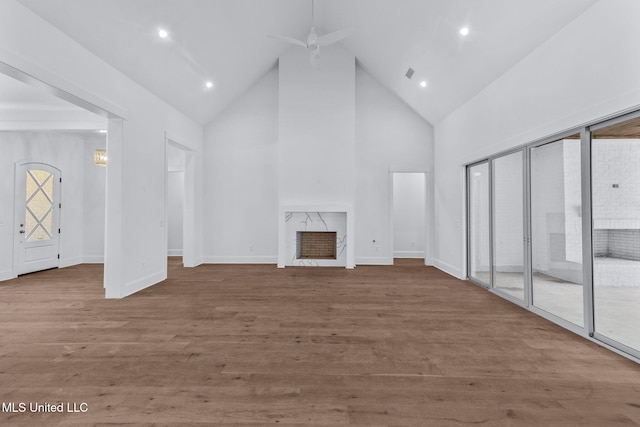 308 Lois Ct, Madison, MS 39110 - unfurnished living room featuring plenty of natural light, high vaulted ceiling, ceiling fan, wood finished floors, and recessed lighting