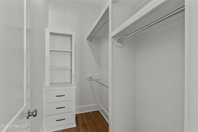 308 Lois Ct, Madison, MS 39110 - walk in closet with dark wood finished floors