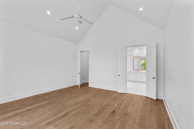 308 Lois Ct, Madison, MS 39110 - unfurnished bedroom featuring high vaulted ceiling, connected bathroom, light wood-style floors, recessed lighting, and baseboards