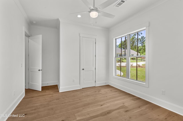 308 Lois Ct, Madison, MS 39110 - unfurnished bedroom featuring crown molding, baseboards, light wood-style flooring, and recessed lighting