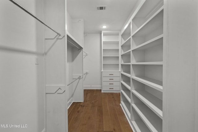 308 Lois Ct, Madison, MS 39110 - walk in closet with dark wood finished floors