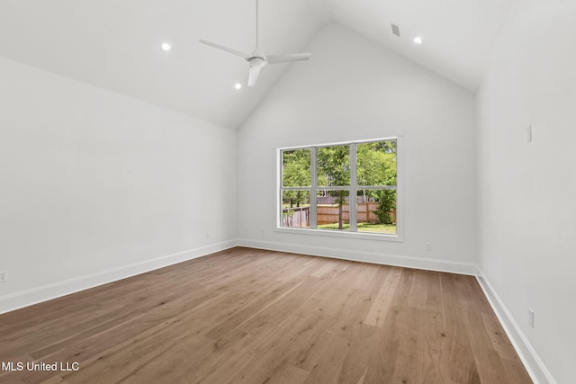 308 Lois Ct, Madison, MS 39110 - empty room featuring high vaulted ceiling, wood finished floors, recessed lighting, ceiling fan, and baseboards
