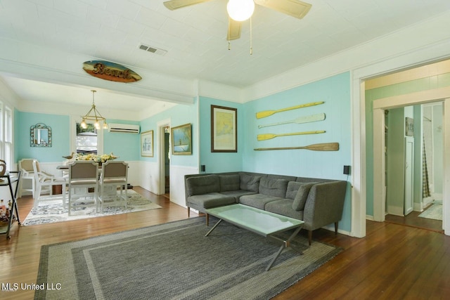 828 Woodward Ave, Gulfport, MS 39501 - living room featuring a wall mounted AC, wood finished floors, ceiling fan, and crown molding