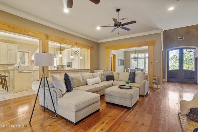 430 Johnstone Dr, Madison, MS 39110 - living room featuring ceiling fan, light wood finished floors, ornamental molding, recessed lighting, and french doors