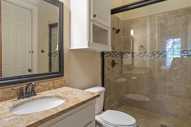 430 Johnstone Dr, Madison, MS 39110 - full bathroom featuring toilet, a tile shower, and vanity