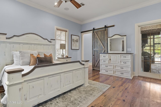 430 Johnstone Dr, Madison, MS 39110 - bedroom with a barn door, dark wood-style flooring, crown molding, ceiling fan, and access to exterior