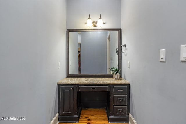430 Johnstone Dr, Madison, MS 39110 - bathroom featuring vanity, baseboards, and wood finished floors