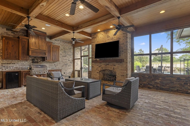 430 Johnstone Dr, Madison, MS 39110 - living area featuring a ceiling fan, a fireplace, wood ceiling with exposed beams, recessed lighting, and brick floors