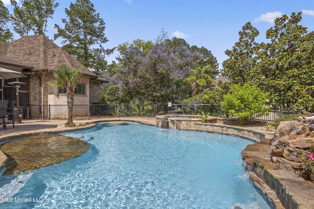 430 Johnstone Dr, Madison, MS 39110 - view of pool with a fenced backyard, a pool with connected hot tub, and a patio area