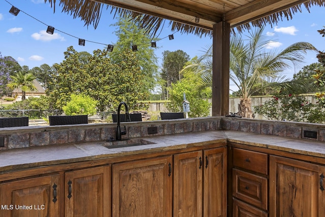 430 Johnstone Dr, Madison, MS 39110 - fenced backyard featuring a sink and exterior kitchen