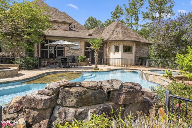 430 Johnstone Dr, Madison, MS 39110 - view of pool featuring a pool with connected hot tub and a patio