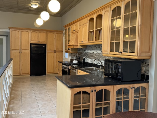 kitchen featuring black appliances, crown molding, light tile patterned floors, and sink