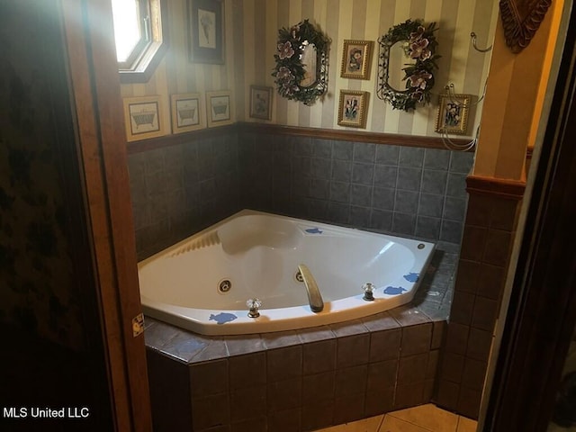 bathroom featuring a whirlpool tub, tile patterned flooring, and wallpapered walls