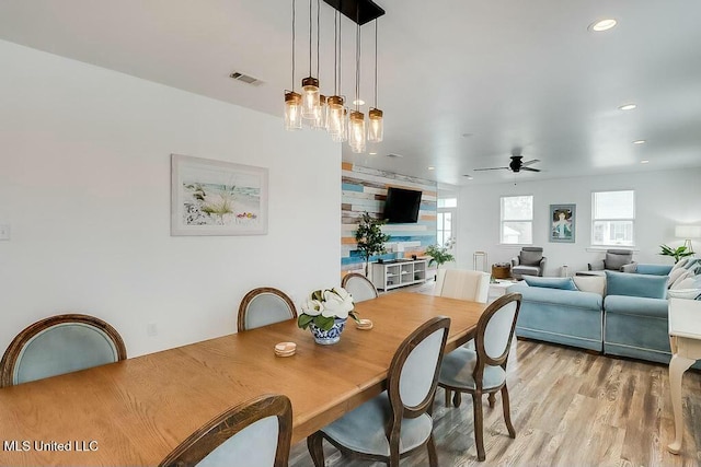 dining area with light wood-style flooring, visible vents, a ceiling fan, and recessed lighting