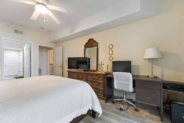 bedroom featuring light hardwood / wood-style floors and ceiling fan