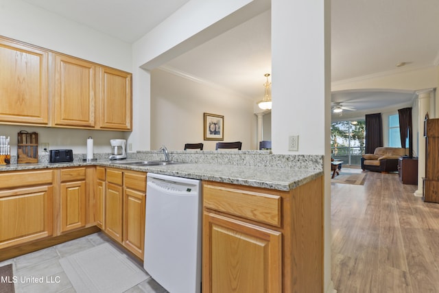 kitchen with light stone counters, white dishwasher, sink, ornamental molding, and light hardwood / wood-style flooring