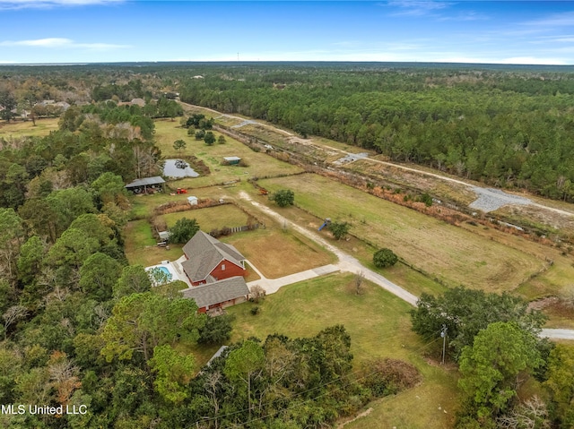 birds eye view of property with a rural view