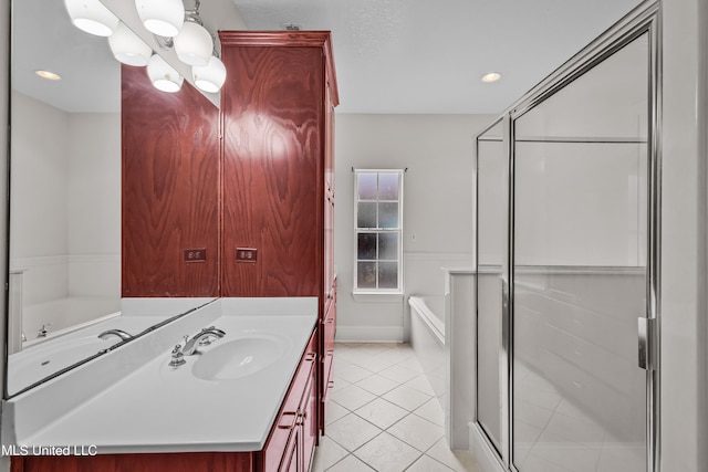 bathroom with tile patterned flooring, vanity, and plus walk in shower