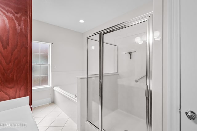 bathroom with separate shower and tub, tile patterned flooring, and vanity