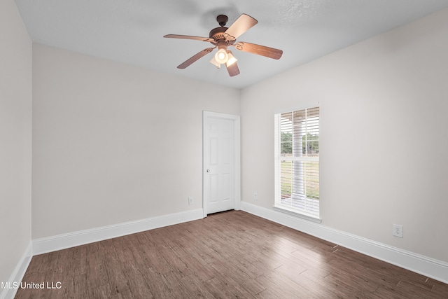 unfurnished room featuring hardwood / wood-style flooring and ceiling fan