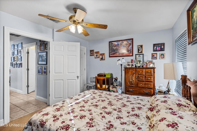 bedroom featuring ceiling fan and light tile patterned flooring