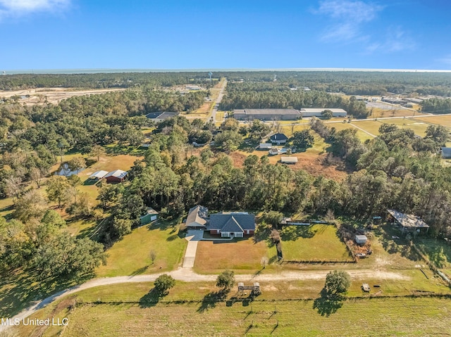 birds eye view of property with a rural view