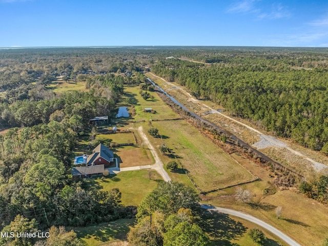 birds eye view of property with a rural view