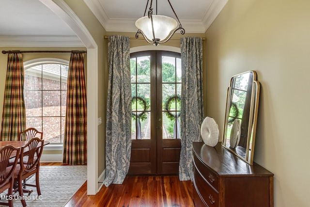 718 Tortoise Rdg, Brandon, MS 39047 - entryway with french doors, arched walkways, dark wood-type flooring, crown molding, and baseboards