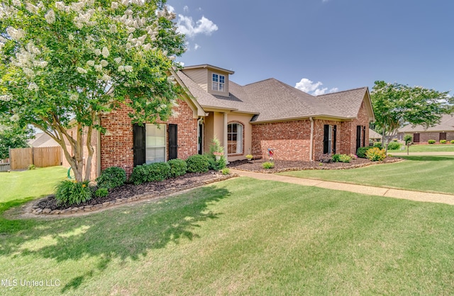 718 Tortoise Rdg, Brandon, MS 39047 - view of front of home featuring brick siding and roof with shingles