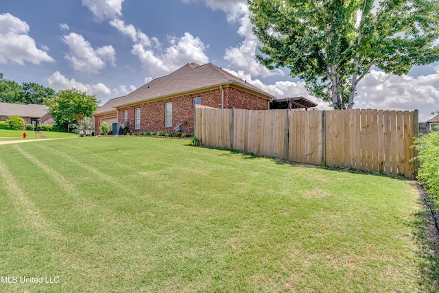 718 Tortoise Rdg, Brandon, MS 39047 - view of yard featuring an attached garage