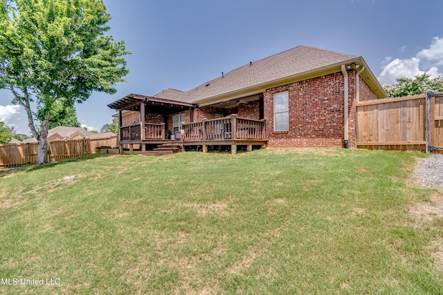 718 Tortoise Rdg, Brandon, MS 39047 - rear view of property featuring brick siding, a deck, and roof with shingles