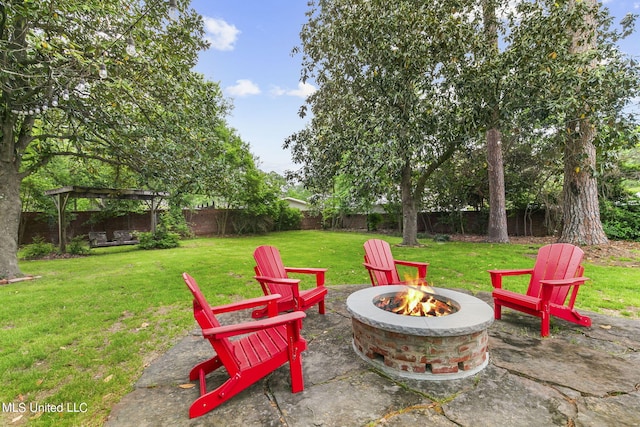 view of patio with a fire pit