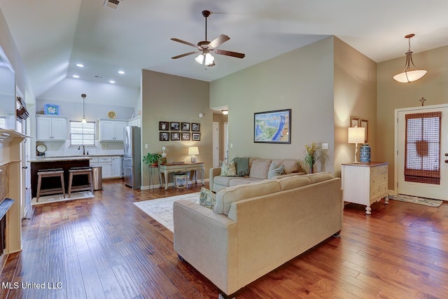 2634 Harvest Tree Dr, Southaven, MS 38672 - living area with a ceiling fan, dark wood-style flooring, recessed lighting, and high vaulted ceiling