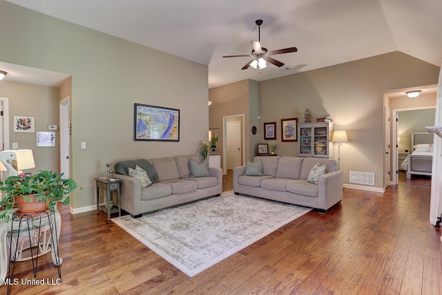 2634 Harvest Tree Dr, Southaven, MS 38672 - living area with a ceiling fan, wood finished floors, and vaulted ceiling