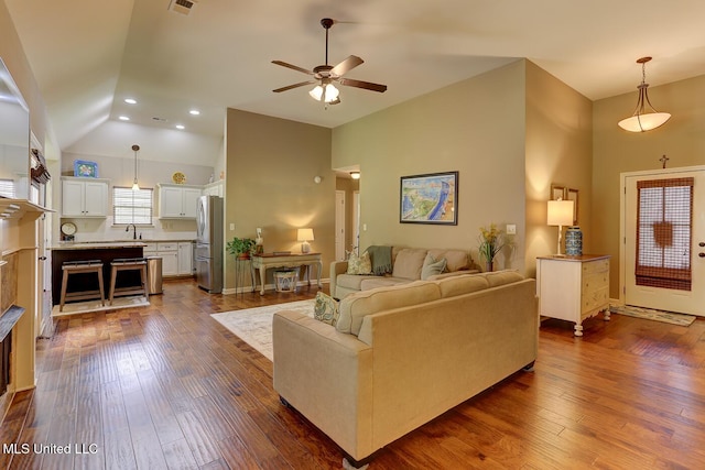2634 Harvest Tree Dr, Southaven, MS 38672 - living room with a ceiling fan, dark wood-type flooring, recessed lighting, and high vaulted ceiling