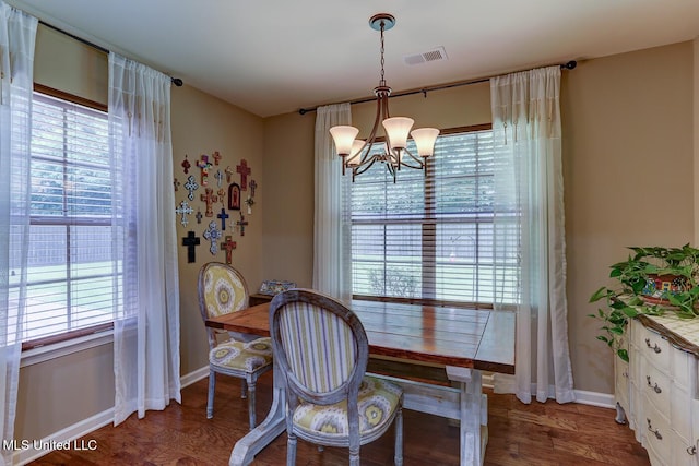2634 Harvest Tree Dr, Southaven, MS 38672 - dining space featuring a chandelier and wood finished floors
