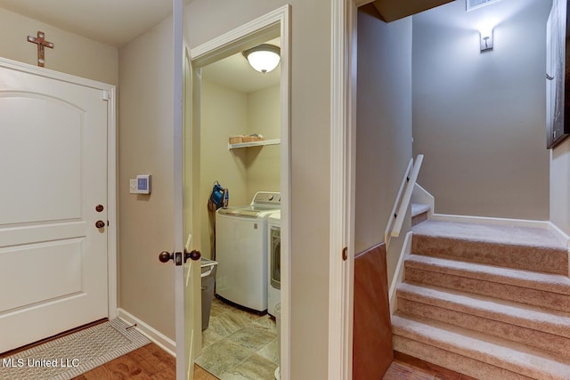 2634 Harvest Tree Dr, Southaven, MS 38672 - washroom featuring separate washer and dryer and light wood-style flooring