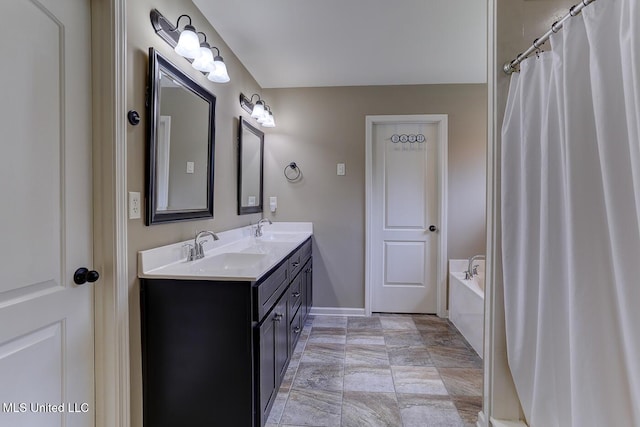 2634 Harvest Tree Dr, Southaven, MS 38672 - full bathroom with double vanity and a bathtub