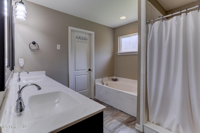 2634 Harvest Tree Dr, Southaven, MS 38672 - full bath with double vanity, a garden tub, a shower with curtain, and recessed lighting