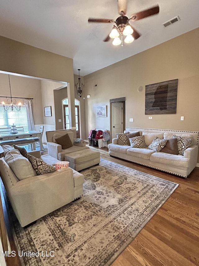 3426 Westwind Dr, Nesbit, MS 38651 - living area featuring a chandelier, wood finished floors, and a ceiling fan