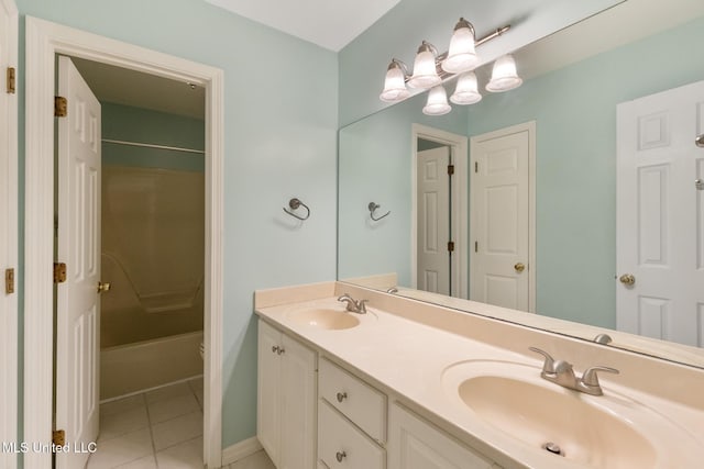 full bathroom featuring a sink, bathing tub / shower combination, double vanity, and tile patterned flooring