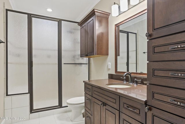 bathroom featuring ornamental molding, a shower with shower door, and tile patterned flooring