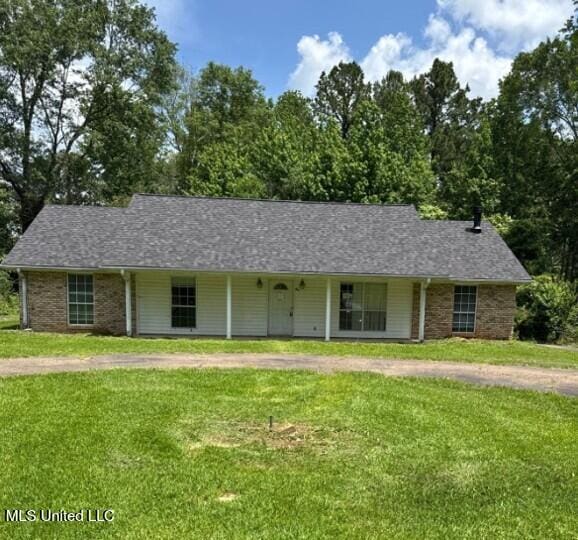 5 Union Church Rd, Tylertown, MS 39667 - view of front of home with a front lawn, covered porch, and brick siding